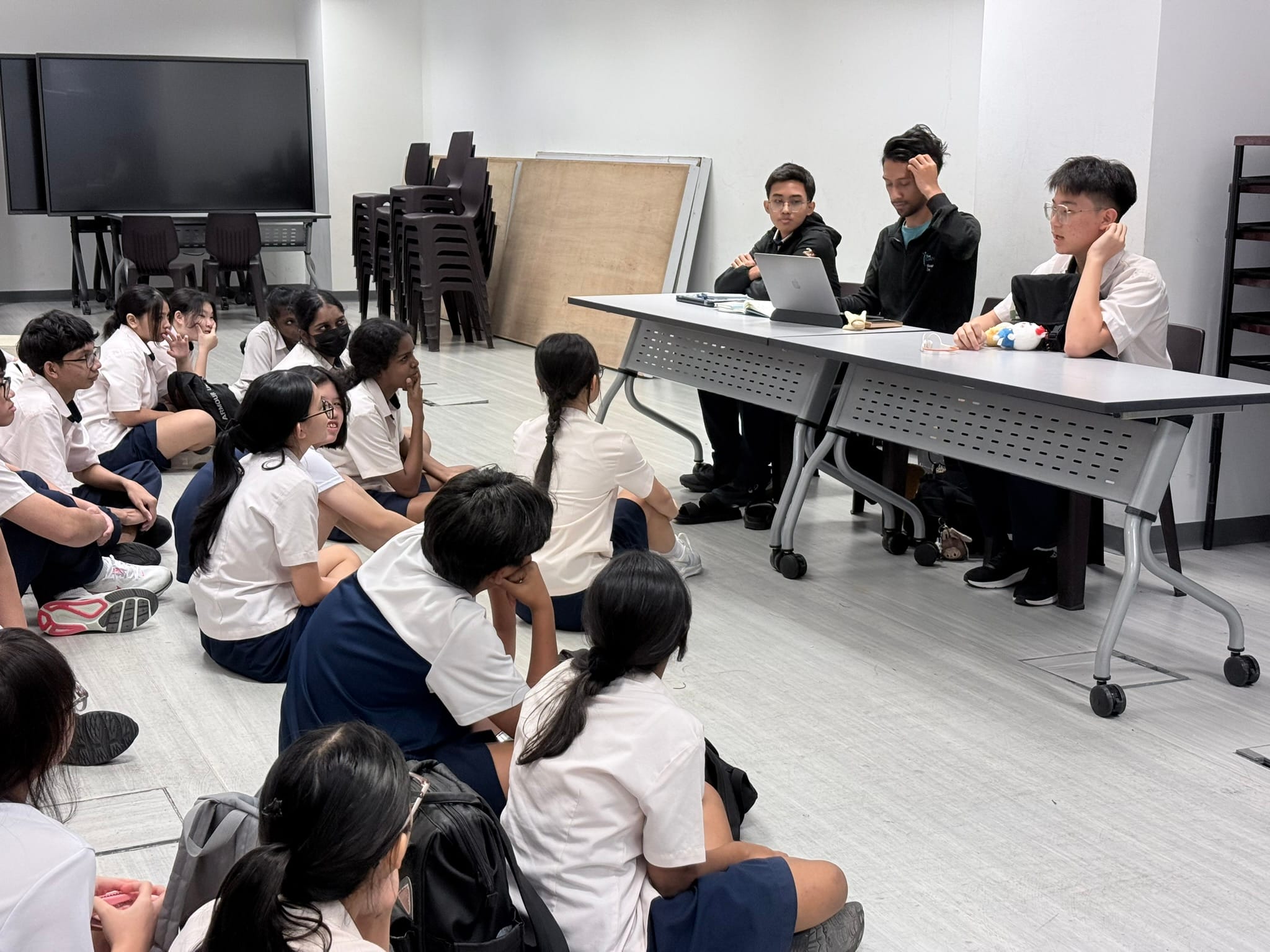 Students in discussion process with our Artistic Director and Student Artistic Directors